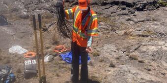 Color photograph of scientists in the field