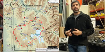 Man standing in front of a map