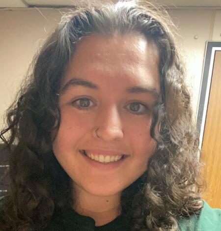 Woman in green USGS shirt