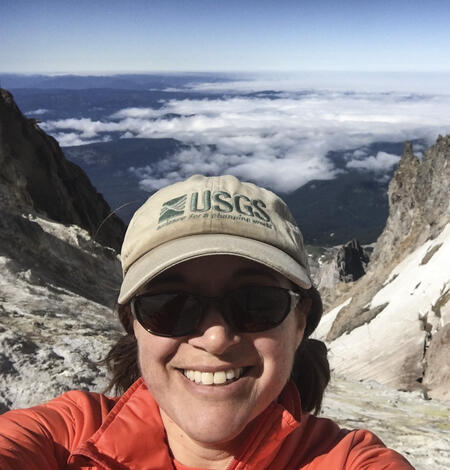 Laura Clor is a gas geochemist at the USGS, shown in this photo at Mount Hood, Oregon