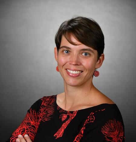 Color photograph of a scientist taken in a photographer studio