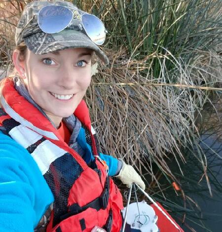 Breann Powers, hydrologic technician at the Virginia and West Virginia Water Science Center, performing field work.