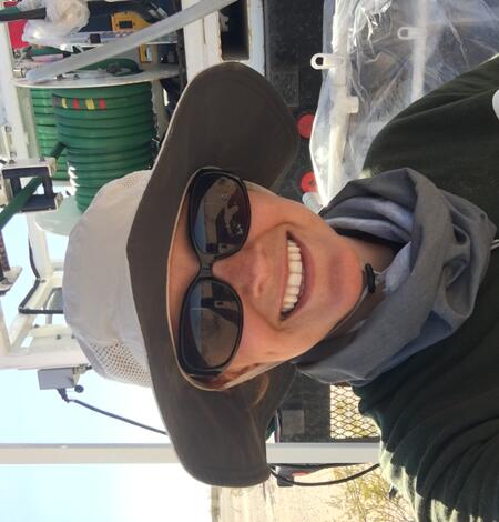 Woman in sunglasses and hat