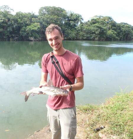Luke holding a Mayan catfish on the Sittee River in Belize.