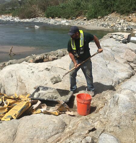 USGS Hydrologic Technician Securing Orfice in Puerto Rico