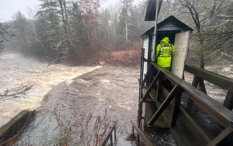Streamgage inspection during rain event