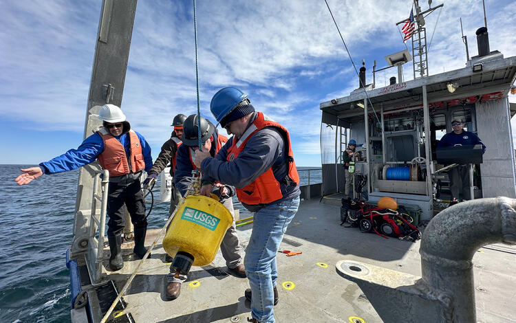 Researchers from the Woods Hole Coastal and Marine Science Center recover oceanographic instruments off Cape Cod.