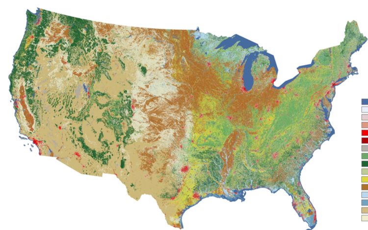 A map of the United States with shades of browns, greens and blues and small splotches of reds
