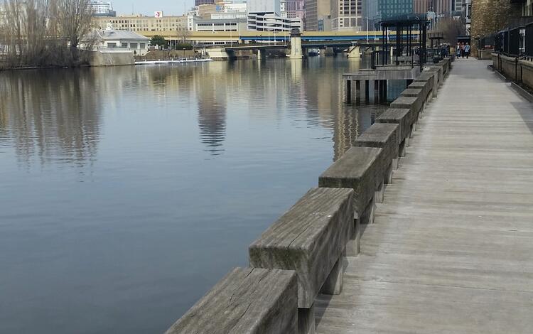 Boardwalk along Milwaukee River looking into downtown Milwaukee