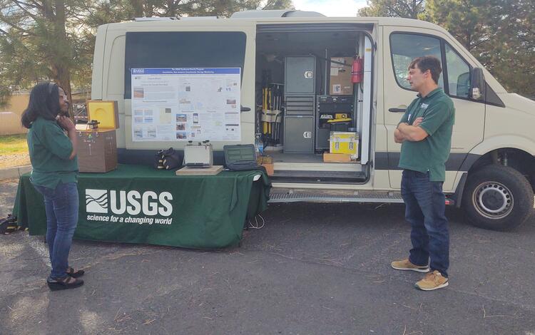 USGS workers discuss what a gravity van is and what it is used for. 