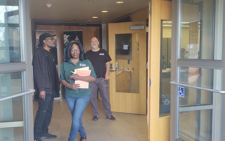 Janet Richie, Greg Vaughn and a visitor at the USGS Astrogeology Science Center in 2023
