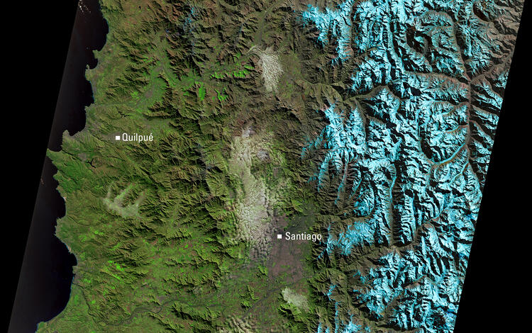 Satellite image of central Chile showing Santiago, Quilpué, and the snow-covered Andes Mountains.