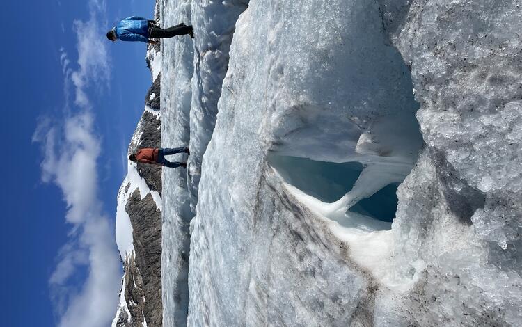 Lemon Creek Glacier with two scientists