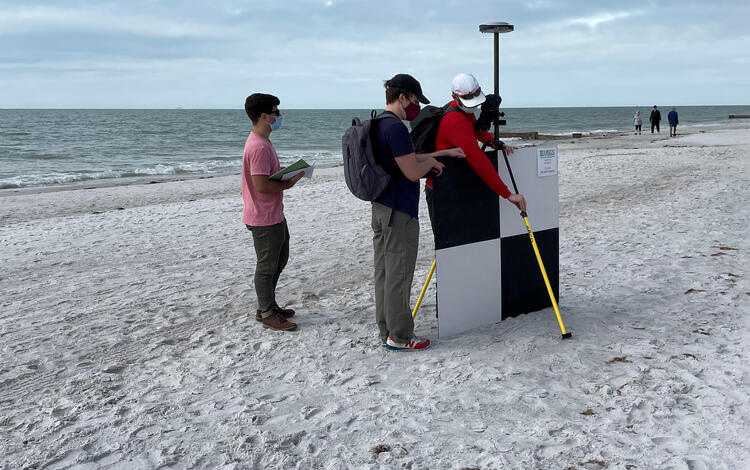 USGS scientists survey camera calibration target at Madeira Beach, FL, USA.