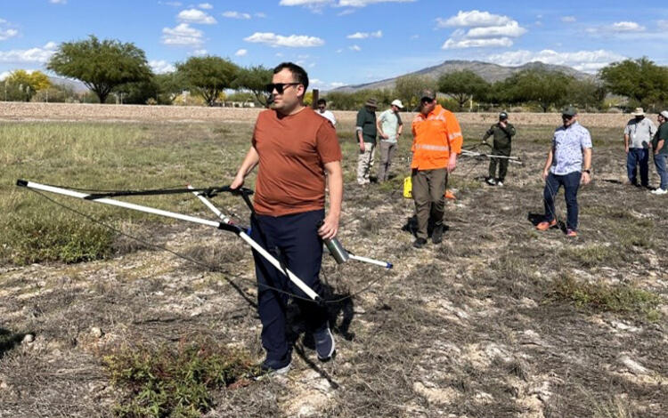 USGS hydrologist leads a field demonstration of a new subsurface geophysics tool