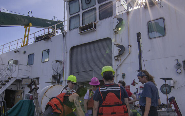 Scientists with a box core sample during the Hawaii Abyssal Nodules Expedition