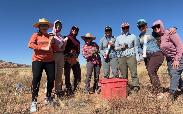 USGS staff and technicians pose for a photo during fieldwork near Moab, Utah