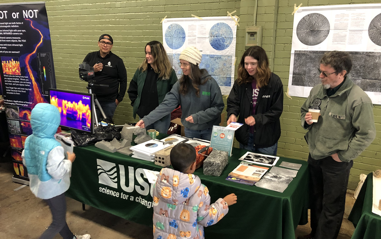 USGS Astrogeology staff table at the Spring 2024 STEM event