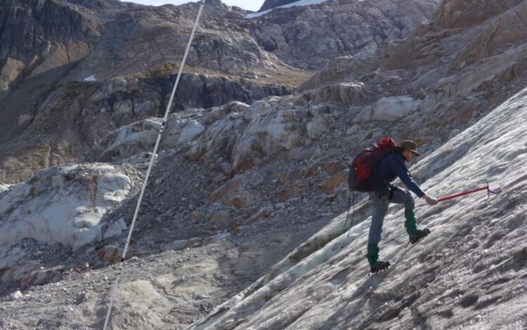Scientist collecting samples on South Cascade Glacier, northwestern Washington State