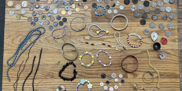 Coins, bills, and jewelry collected in summer 2026 by the Yellowstone National Park Geology Team