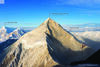 Recent landslide on the east face of Mt. King George (3741 m) with clouds of dust from ongoing rockfall. Debris descended over 1500 m to the glacier below. 