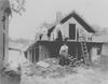 North Topeka 2 story home with silt piled around after 1903 flood